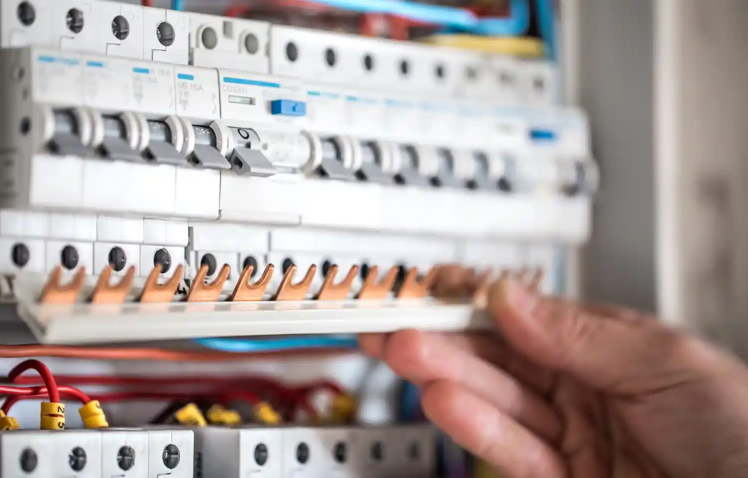 Atlanta electrician installing circuit breakers on residential electrical panel what size electrical panel Atlanta home needs